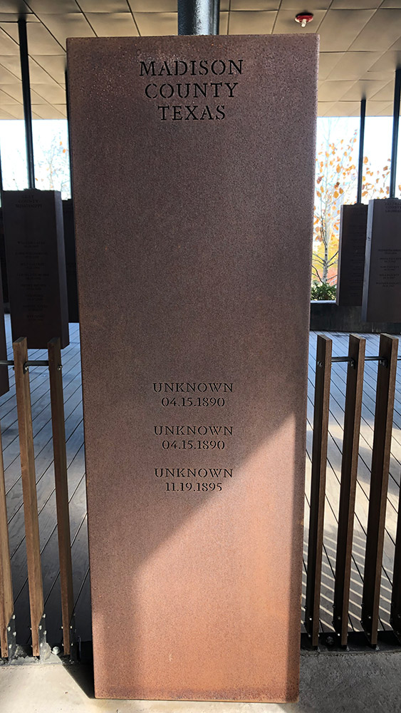 Six-foot Corten steel monument for Madison County Texas listing unknown two persons lynched on 4.15.1890 and one on 11.19.1895.