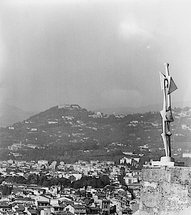 Black-and-white photograph of a Henry Moore sculpture, "Standing Figure," in the Forte di Belvedere, Florence