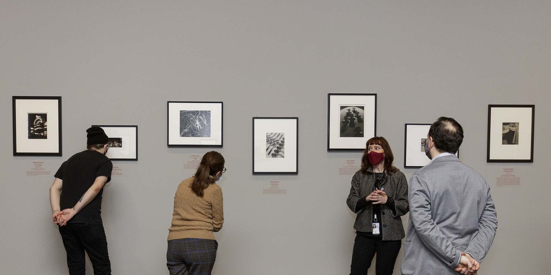 View of the top of the East Building tower, with green trees on each side
