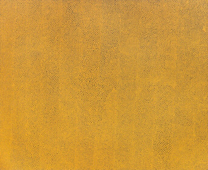 A fine, dense marigold-yellow net weaves around dark dots in this horizontal, abstract painting. Most of the painting is yellow, and the spots are irregularly shaped, they vary in size, and they are loosely arranged in twelve columns. The columns bleed into each other to create undulating waves and swirls across the canvas.