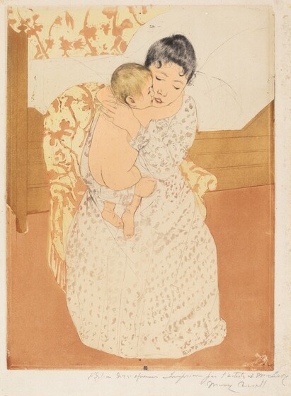 We look slightly down onto a young woman sitting in an upholstered chair and tightly hugging a nude, blond child in this vertical, colored print. Both have pale, peach-toned skin. The woman’s black hair is pulled back though a couple tendrils curl on her forehead. Her eyes are downcast and her pink lips parted. She wears a long, cream-white dress dotted with blush-pink, petal-like forms. One arm is under the baby’s chubby bottom and the other braces the child behind the shoulders. The baby wraps their arms around the woman’s neck so they are cheek to cheek. The chair sits in front of a bed with a boxy frame and a pillowy white mattress. The upholstery on the woman’s chair and the wallpaper behind her are patterned with coral-pink flowers and vines against butter yellow. The floor is also coral pink. A mark with an oval, or a mirrored C, over an uppercase M, is stamped in royal blue at the bottom center of the print. The sheet is inscribed with graphite across the right half of the bottom margin, “Edition de 25 épreuves Imprimée par l'artiste et M. Leroy Mary Cassatt.”