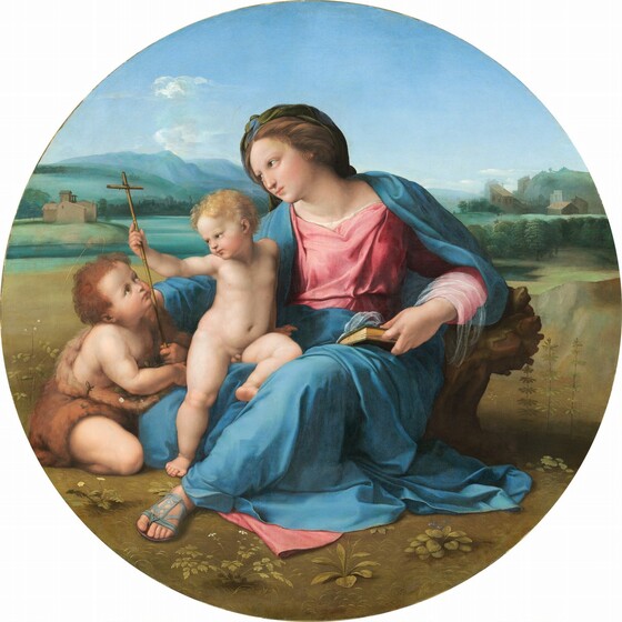 A woman and two children, all with pale skin and flushed cheeks, sit together in a landscape in this round painting. The woman takes up most of the composition as she sits with her right leg, to our left, tucked under her body. Her other leg, on our right, is bent so the foot rests on the ground, and that knee angles up and out to the side. She wears a rose-pink dress under a topaz-blue robe, and a finger between the pages of a closed book holds her place. Her brown hair is twisted away from her face. She has delicate features and her pink lips are closed. She looks and leans to our left around a nude young boy who half-sits and half-stands against her bent leg. The boy has blond hair and pudgy, toddler-like cheeks and body. The boy reaches his right hand, on our left, to grasp the tall, thin cross held by the second young boy, who sits on the ground next to the pair. This second boy has darker brown hair and wears a garment resembling animal fur. The boy kneels facing the woman and looks up at her and the blond boy. The trio sits on a flat, grassy area in front of a body of water painted light turquoise. Mountains in the deep distance are pale azure blue beneath a nearly clear blue sky.